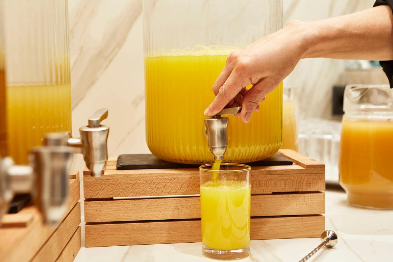 安道尔广场酒店 安道尔城 外观 照片 Orange juice